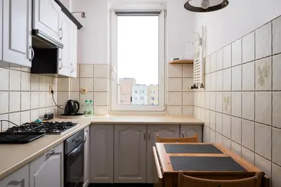 Kuchnia lub aneks kuchenny w obiekcie Praga Łukowska Comfort Apartment by BookingHost