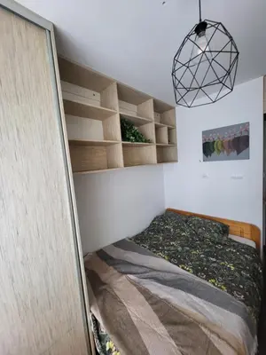 Łóżko lub łóżka w pokoju w obiekcie Apartament Cora Lego