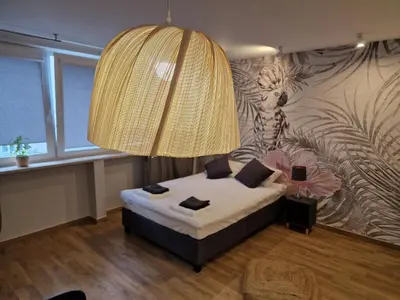 Łóżko lub łóżka w pokoju w obiekcie Bubble's apartment