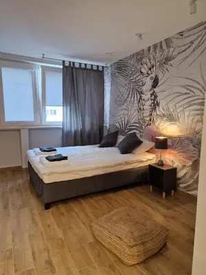 Łóżko lub łóżka w pokoju w obiekcie Bubble's apartment