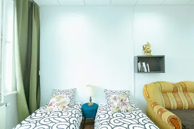 Łóżko lub łóżka w pokoju w obiekcie Hostel Metro Kabaty