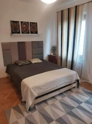 Łóżko lub łóżka w pokoju w obiekcie Green Apartament Żoliborz