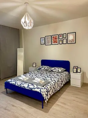 Łóżko lub łóżka w pokoju w obiekcie HALBY rooms Prosta 2