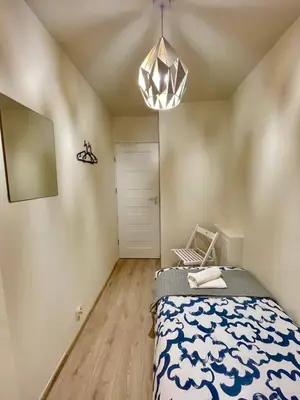 Łóżko lub łóżka w pokoju w obiekcie HALBY rooms Prosta 2