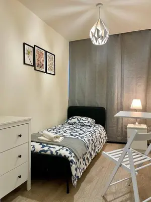 Łóżko lub łóżka w pokoju w obiekcie HALBY rooms Prosta 2