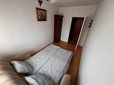 Łóżko lub łóżka w pokoju w obiekcie Mieszkanie RETRO 57m2