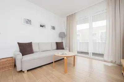 Część wypoczynkowa w obiekcie Słoneczny Apartament z Parkingiem by Noclegi Renters