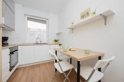 Kuchnia lub aneks kuchenny w obiekcie Słoneczny Apartament z Parkingiem by Noclegi Renters