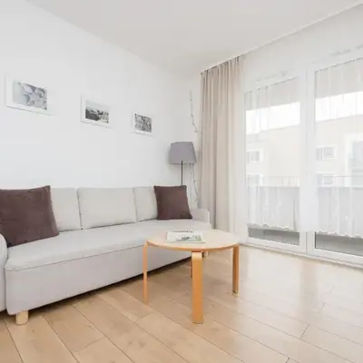 Słoneczny Apartament z Parkingiem by Noclegi Renters
