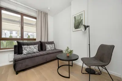 Część wypoczynkowa w obiekcie Spacious Family Apartment with Garden & Parking by Noclegi Renters