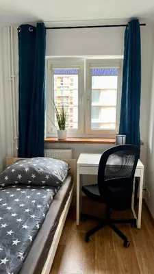 Łóżko lub łóżka w pokoju w obiekcie Rooms in Warsaw - C116-118