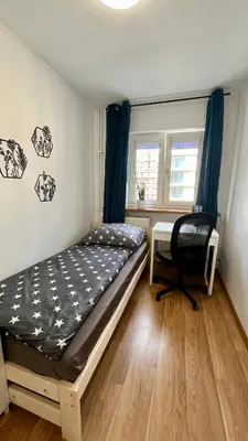 Łóżko lub łóżka w pokoju w obiekcie Rooms in Warsaw - C116-118