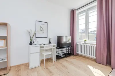 Łóżko lub łóżka w pokoju w obiekcie Zajęcza Apartment near Copernicus Center by Mia