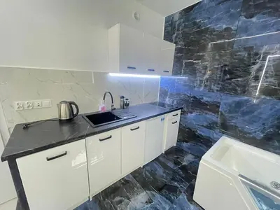 Kuchnia lub aneks kuchenny w obiekcie YOURAPART Karmelicka z Jacuzzi