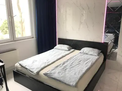 Łóżko lub łóżka w pokoju w obiekcie YOURAPART Karmelicka z Jacuzzi