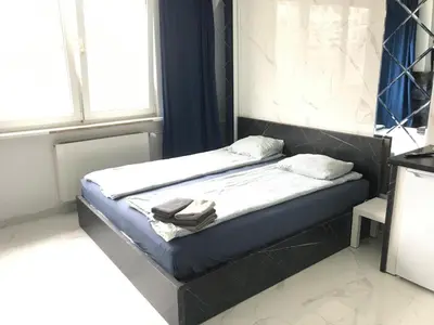 Łóżko lub łóżka w pokoju w obiekcie YOURAPART Karmelicka z Jacuzzi