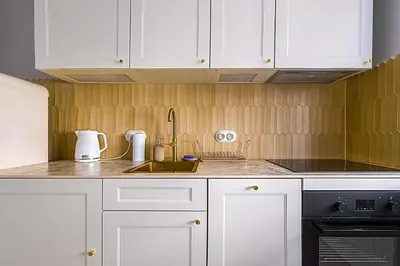 Kuchnia lub aneks kuchenny w obiekcie Apartament Koszykowa 3