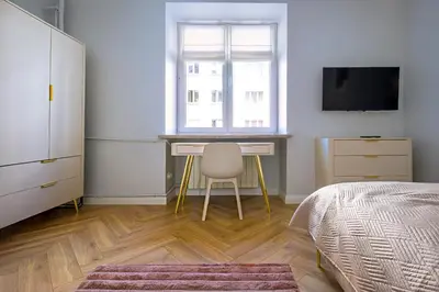 Telewizja i/lub zestaw kina domowego w obiekcie Apartament Koszykowa 3
