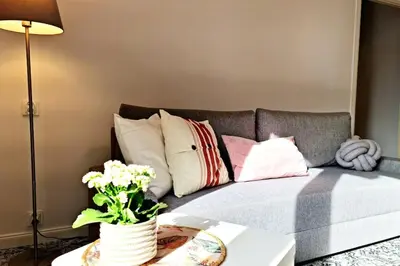 Łóżko lub łóżka w pokoju w obiekcie Apartament Zachodni z balkonem 4 osoby