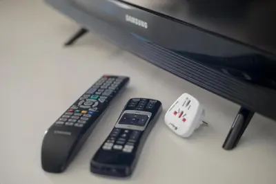 Telewizja i/lub zestaw kina domowego w obiekcie Quest on Grzybowska