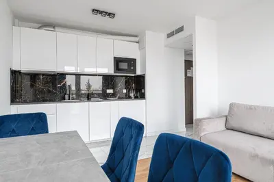 Kuchnia lub aneks kuchenny w obiekcie RentPlanet - Apartamenty Pileckiego