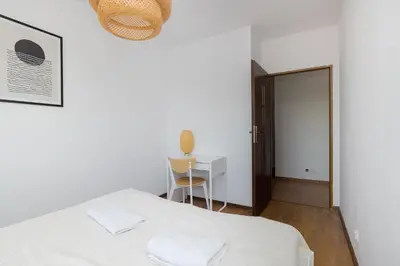 Łóżko lub łóżka w pokoju w obiekcie ShortStayPoland Tomcia Palucha B118