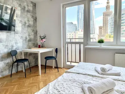 Łóżko lub łóżka w pokoju w obiekcie Super central, amazing view! 55''smart TV & fast WiFi