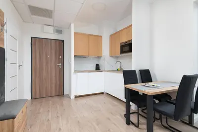 Kuchnia lub aneks kuchenny w obiekcie RentPlanet - Bliska Wola