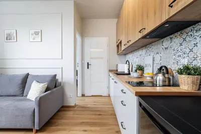 Kuchnia lub aneks kuchenny w obiekcie SuperApart Zdobnicza 4 - Komfortowy apartament