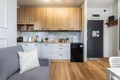 Kuchnia lub aneks kuchenny w obiekcie SuperApart Zdobnicza 4 - Komfortowy apartament