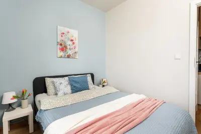 Łóżko lub łóżka w pokoju w obiekcie SuperApart Zdobnicza 4 - Komfortowy apartament