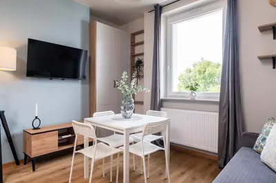 Telewizja i/lub zestaw kina domowego w obiekcie SuperApart Zdobnicza 4 - Komfortowy apartament