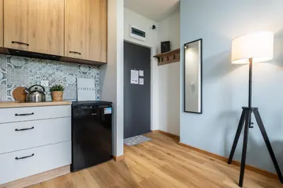 Kuchnia lub aneks kuchenny w obiekcie SuperApart Zdobnicza 4 - Komfortowy apartament