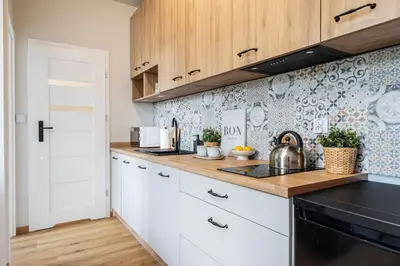 Kuchnia lub aneks kuchenny w obiekcie SuperApart Zdobnicza 4 - Komfortowy apartament