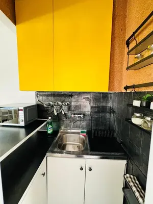 Kuchnia lub aneks kuchenny w obiekcie Złota Studio