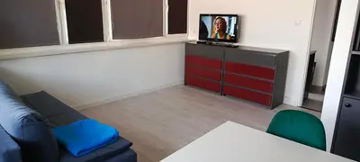 Telewizja i/lub zestaw kina domowego w obiekcie -- Warsaw Center Apartment --