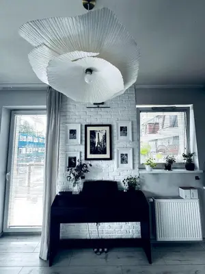 Łóżko lub łóżka w pokoju w obiekcie Cosy Apartment near Stadion Narodowy