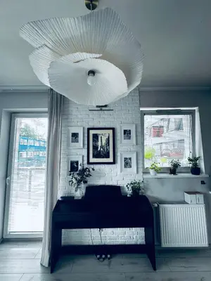 Łóżko lub łóżka w pokoju w obiekcie Cosy Apartment near Stadion Narodowy