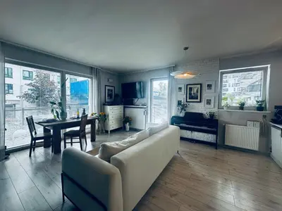 Część wypoczynkowa w obiekcie Cosy Apartment near Stadion Narodowy