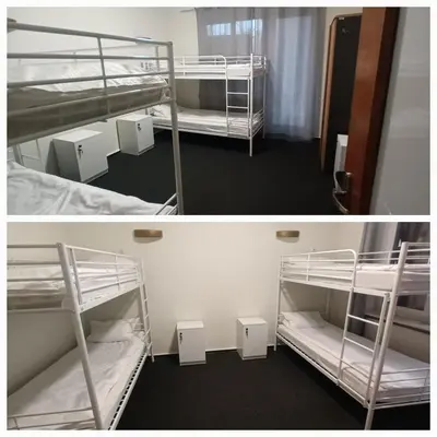 Łóżko lub łóżka w pokoju w obiekcie Hostel WILA AIRPORT