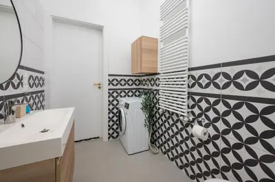 Kuchnia lub aneks kuchenny w obiekcie Wilcza City Centre Deluxe Apartment by BookingHost