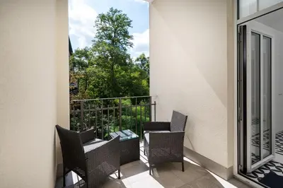 Balkon lub taras w obiekcie Wilcza City Centre Deluxe Apartment by BookingHost