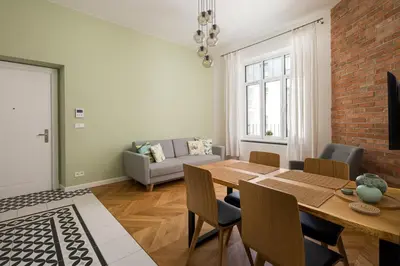 Część wypoczynkowa w obiekcie Wilcza City Centre Deluxe Apartment by BookingHost