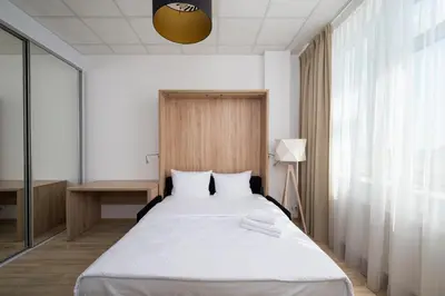 Łóżko lub łóżka w pokoju w obiekcie Varsovia Jerozolimskie Studio 232 by BookingHost