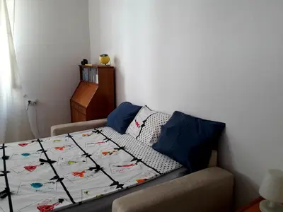Łóżko lub łóżka w pokoju w obiekcie Metro Politechnika Apartment