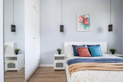Łóżko lub łóżka w pokoju w obiekcie Światowida 74 SuperApart