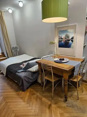 Łóżko lub łóżka w pokoju w obiekcie Studio Orient Express