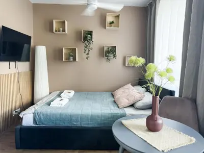 Łóżko lub łóżka w pokoju w obiekcie Cappuccino Studio #self check-in