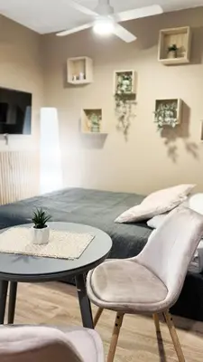 Telewizja i/lub zestaw kina domowego w obiekcie Cappuccino Studio #self check-in