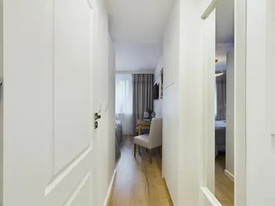 Łóżko lub łóżka w pokoju w obiekcie Unique Studio for 2 people Wilanowska in Warsaw by Noclegi Renters